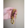 Islamic tasbih with smooth pressed amber beads