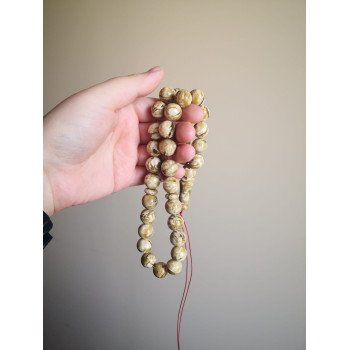 Polished resin prayer beads tasbih with pressed amber