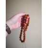 Shiny pressed damla prayer beads with Baltic amber